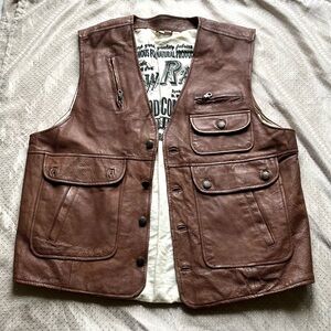 Authentic Leather vest with a cream colored interior from the brand “Raw Rags”